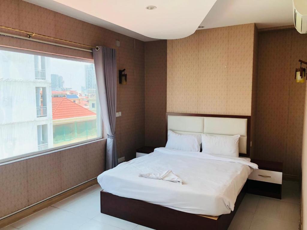 Double Room at Sai&Su Hotel Phnom Penh - Minimalist comfort for the discerning traveler